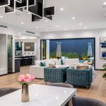 Spacious living and dining room with wooden floors
